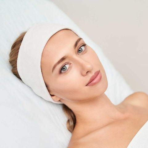 A woman with clear and radiant skin from a chemical peel.